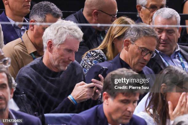 Denis Brogniart and Julien Courbet are seen at the Rolex Paris Masters - Day Six at Palais Omnisports de Bercy on November 05, 2023 in Paris, France.