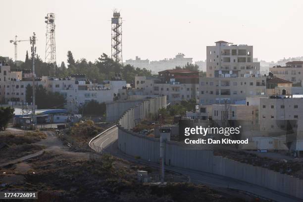 Separation wall dividing the Palestinian West Bank territory and Israeli settlements on November 04, 2023 in Al-Ram, West Bank. The war between...