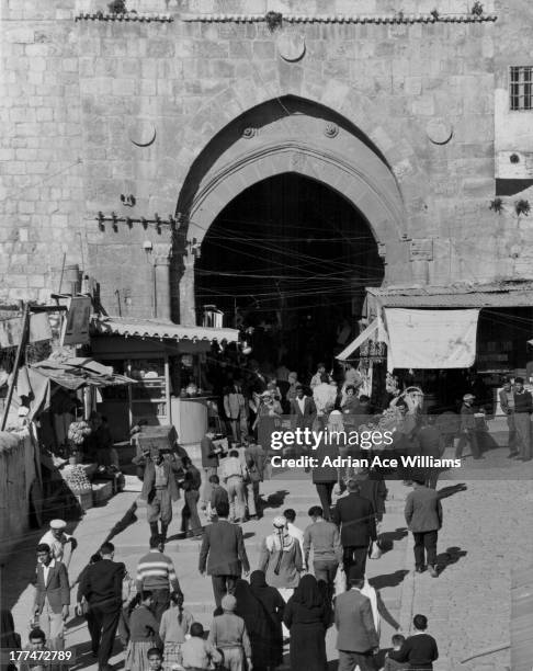 Damascus Gate, the main entrance to the Old City of Jerusalem, on the city's northwest side where the highway leads out to Nablus, Israel, circa...