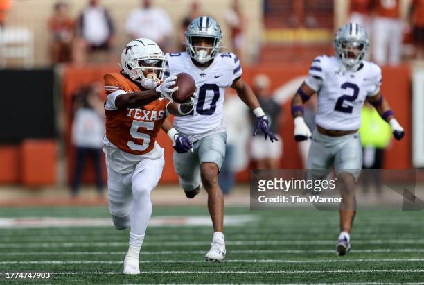 Adonai Mitchell of the Texas Longhorns catches a pass in the first quarter against the Kansas State Wildcats at Darrell K Royal-Texas Memorial...