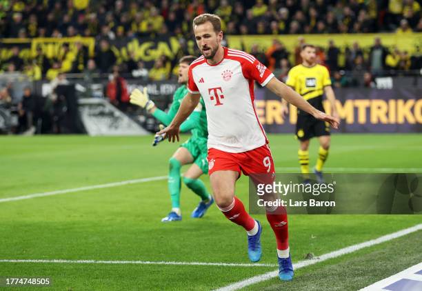 Harry Kane of Bayern Munich celebrates after scoring the team's second goal during the Bundesliga match between Borussia Dortmund and FC Bayern...