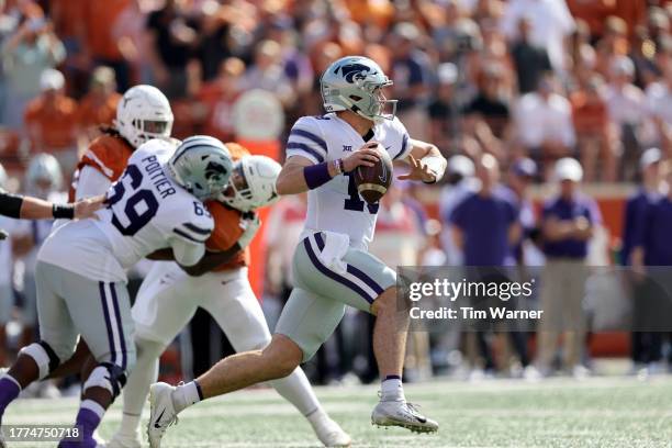 Will Howard of the Kansas State Wildcats scrambles in the second quarter against the Texas Longhorns at Darrell K Royal-Texas Memorial Stadium on...