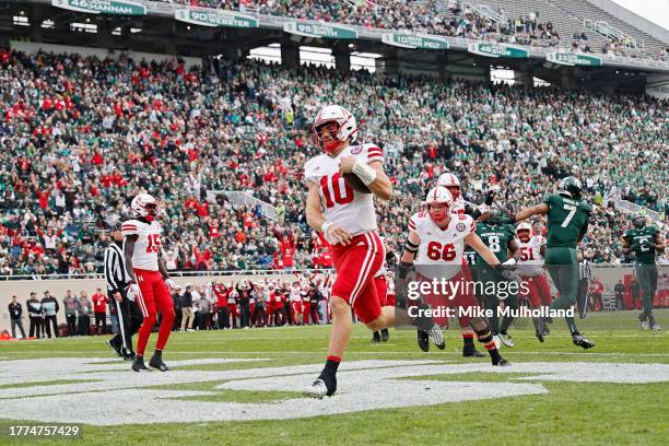 Heinrich Haarberg of the Nebraska Cornhuskers runs for a touchdown in the second quarter of a game against the Michigan State Spartans at Spartan...