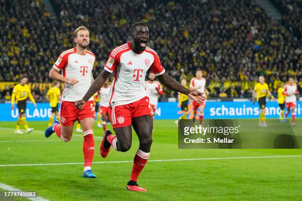 Dayot Upamecano of Bayern Munich celebrates after scoring the team's first goal during the Bundesliga match between Borussia Dortmund and FC Bayern...
