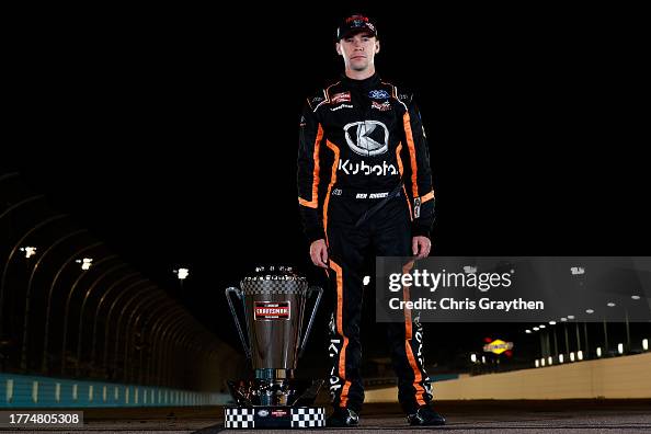 Ron Rhodes Driver Ben Rhodes, driver of the Kubota Ford, poses with the 2023 NASCAR ...