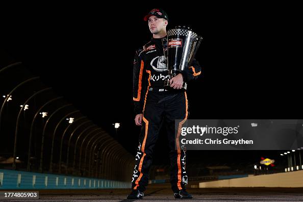 Ron Rhodes Driver Ben Rhodes, driver of the Kubota Ford, poses with the 2023 NASCAR ...