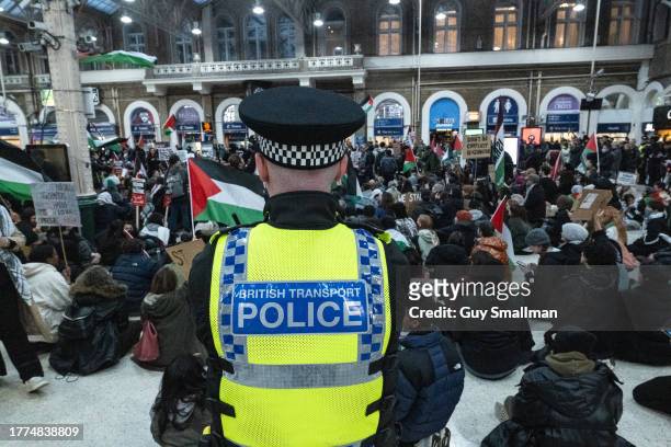 Protestors hold a sit-in at Charing Cross Station as Pro-Palestinian protest groups call for an Immediate ceasefire in Gaza on November 4, 2023 in...