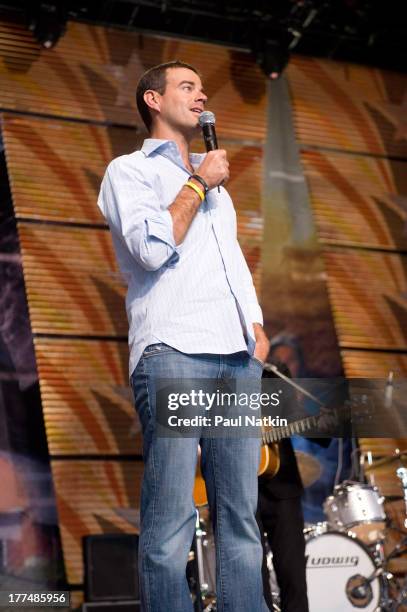 View of American television personality Carson Daly on stage during the Farm Aid 2008 concert at the Comcast Center, Mansfield, Massachussetts,...