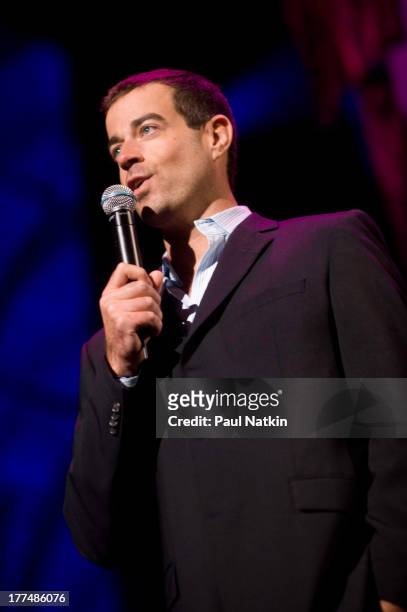 View of American television personality Carson Daly on stage during the Farm Aid 2008 concert at the Comcast Center, Mansfield, Massachussetts,...