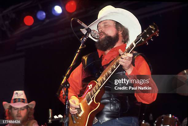 American musician Charlie Daniels performs on stage, Chicago, Illinois, August 12, 1983.