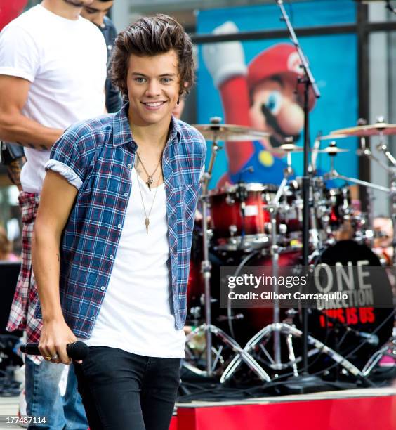 Harry Styles of One Direction performs on NBC's "Today" at Rockefeller Plaza on August 23, 2013 in New York, New York.