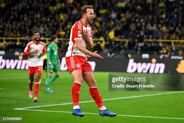 Harry Kane of Bayern Munich celebrates after scoring the team's fourth goal during the Bundesliga match between Borussia Dortmund and FC Bayern...