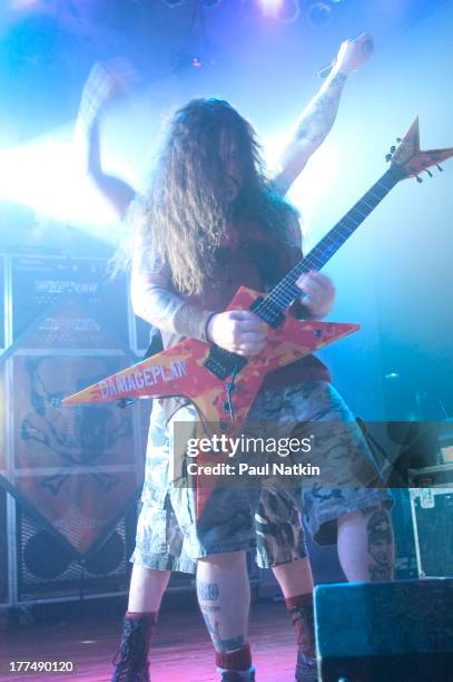 American music group Damageplan performs on stage at the House of Blues, Chicago, Illinois, April 8, 2004. Pictured is Dimebag Darrell and, behind...