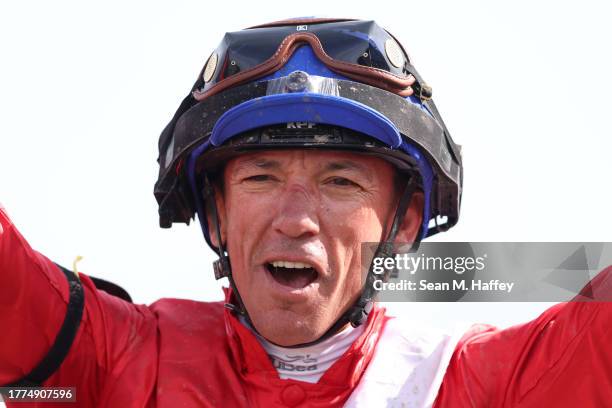 Lanfranco Dettori aboard Inspiral of Great Britain celebrates after winning the Maker's Mark Breeders' Cup Filly and Mare Turf race at Santa Anita...