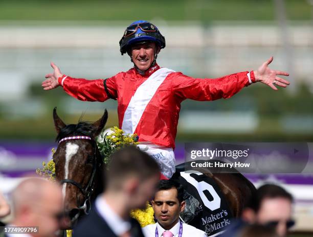 Jockey Lanfranco Dettori celebrates victory atop Inspiral of Great Britain during the Maker's Mark Breeders' Cup Filly and Mare Turf at Santa Anita...