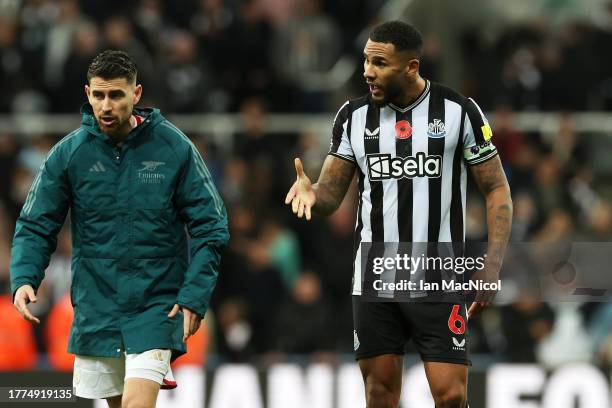 Jamaal Lascelles of Newcastle United clashes with Jorginho of Arsenal following the Premier League match between Newcastle United and Arsenal FC at...