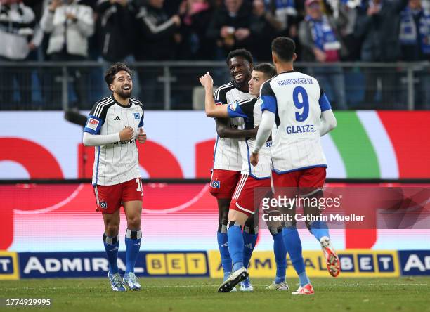 Laszlo Benes of Hamburger SV and his teammates celebrates after scoring the team's first goal during the Second Bundesliga match between Hamburger SV...