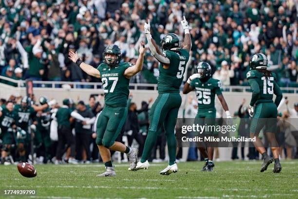 Cal Haladay of the Michigan State Spartans reacts after a turnover on downs by the Nebraska Cornhuskers in the fourth quarter of a game at Spartan...