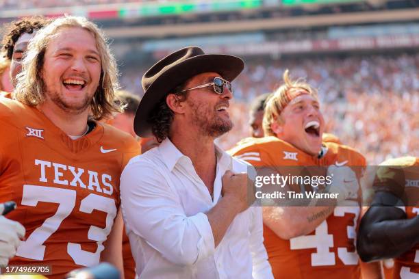 Actor Matthew McConaughey celebrates with the Texas Longhorns after defeating the Kansas State Wildcats at Darrell K Royal-Texas Memorial Stadium on...