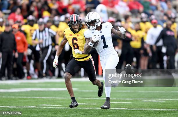KeAndre Lambert-Smith of the Penn State Nittany Lions runs with the ball after a catch against Corey Coley Jr. #6 of the Maryland Terrapins at SECU...