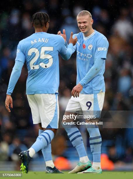 Manuel Akanji of Manchester City with Erling Haaland of Manchester City during the Premier League match between Manchester City and AFC Bournemouth...