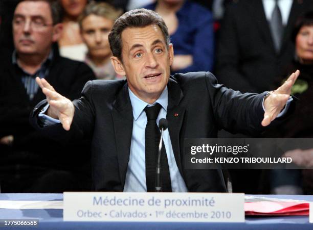 French president Nicolas Sarkozy gestures as he holds a roundtable at the liberal and ambulatory Health centre in Orbec, northwestern France, on...