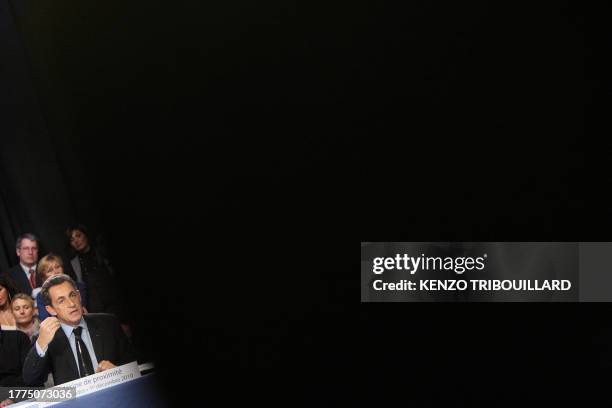 French president Nicolas Sarkozy gestures as he holds a roundtable at the liberal and ambulatory Health centre in Orbec, northwestern France, on...