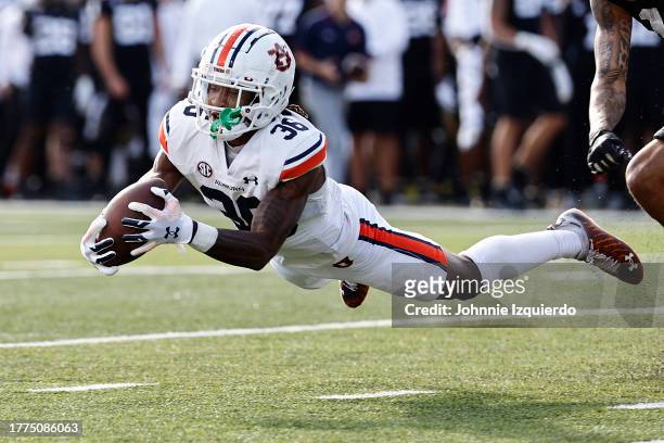 Jaylin Simpson of the Auburn Tigers recovers a fumble during the first half of the game against the Vanderbilt Commodores at FirstBank Stadium on...