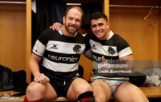 Alun Wyn Jones of Barbarians poses for a photograph with Izaia Perese in the changing room after the Test Match between Wales and Barbarians at...