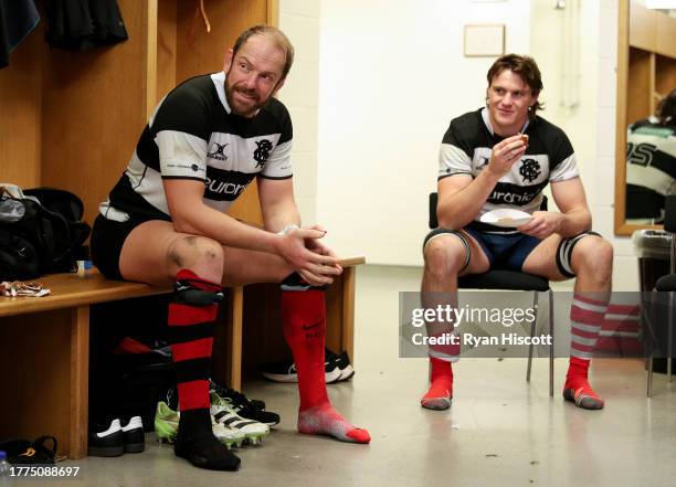 Alun Wyn Jones of Barbarians looks on as he speaks with teammates in the changing room after the Test Match between Wales and Barbarians at...