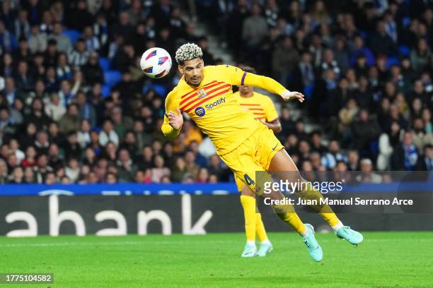 Ronald Araujo of FC Barcelona scores the team's first goal during the LaLiga EA Sports match between Real Sociedad and FC Barcelona at Reale Arena on...