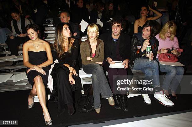 Singer Mandy Moore and band The Strokes with guests attend the Marc Jacobs fashion show for the Fall/Winter 2003 Collection at The Armory during the...