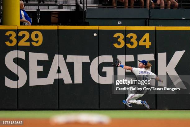 Travis Jankowski of the Texas Rangers catches a fly ball during a game against the Houston Astros at Globe Life Field on September 06, 2023 in...