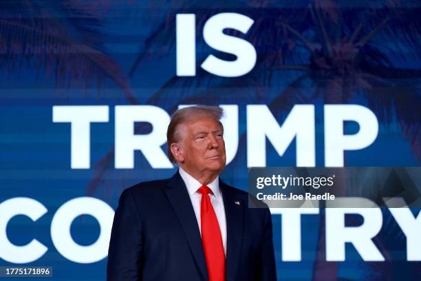 Republican presidential candidate former U.S. President Donald Trump looks on during the Florida Freedom Summit at the Gaylord Palms Resort on...