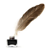 Feather pen into the inkwell.