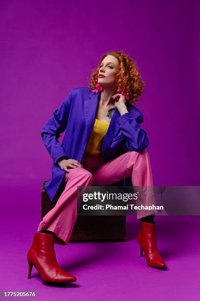 stylish woman wearing colorful clothes - multi colored blazer stock-fotos und bilder