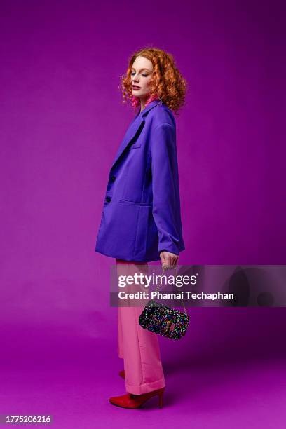 stylish woman wearing colorful clothes - multi colored blazer stock-fotos und bilder