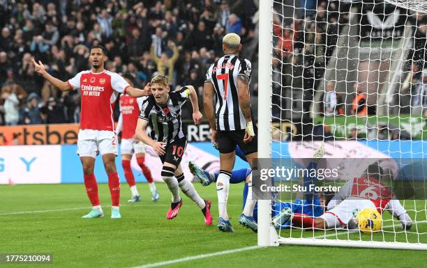 Newcastle player Anthony Gordon runs away to celebrate after scoring the winning goal during the Premier League match between Newcastle United and...