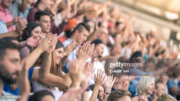 large crowd in a football stadium - åskådarläktare bildbanksfoton och bilder