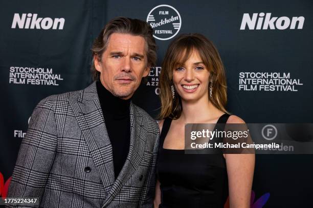 Ethan Hawke and Maya Hawke pose on the red carpet during a ceremony for the Stockholm Film Festival's Lifetime Achievement Award 2023 at Biograf...