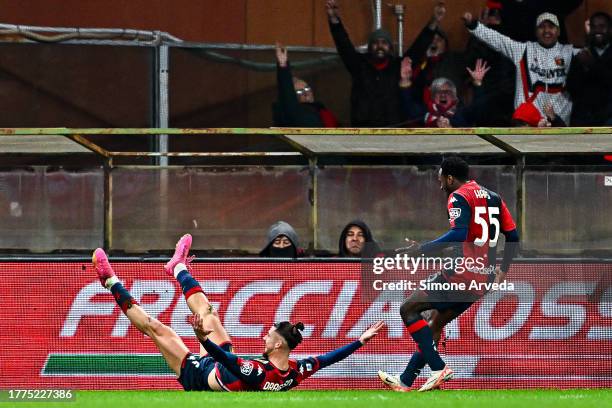 Radu Dragusin of Genoa celebrates with his team-mate Ridgeciano Haps after scoring a goal during the Serie A TIM match between Genoa CFC and Hellas...