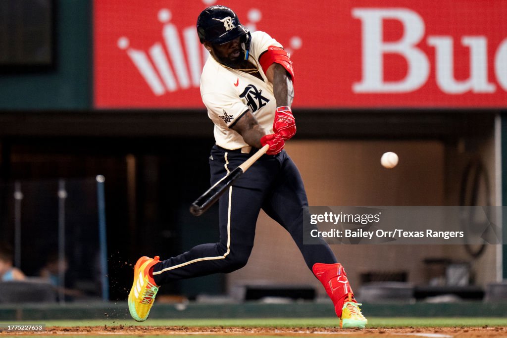 Adolis Garcia of the Texas Rangers bats during a game against the
