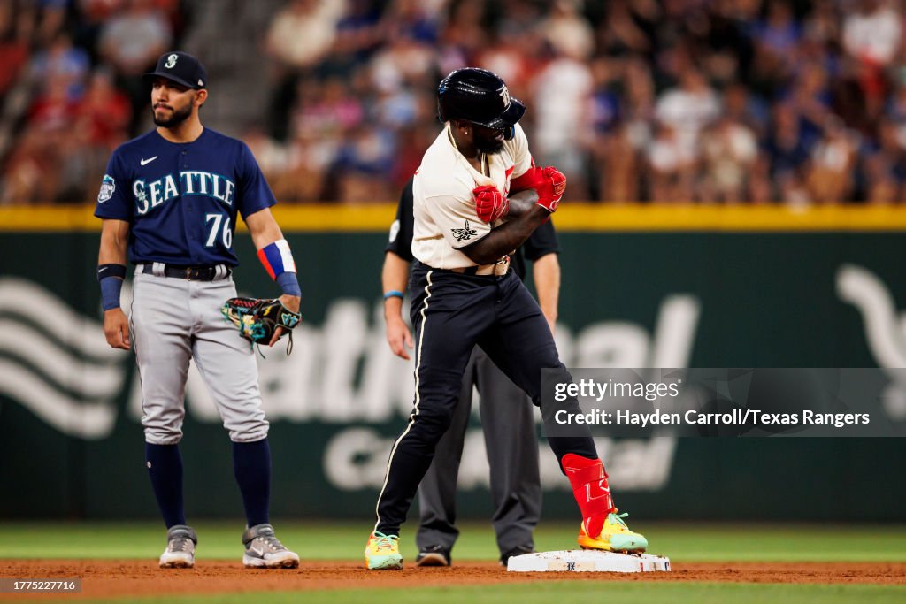 Seattle Rangers Adolis Garcia of the Texas Rangers celebrates during a game against ...