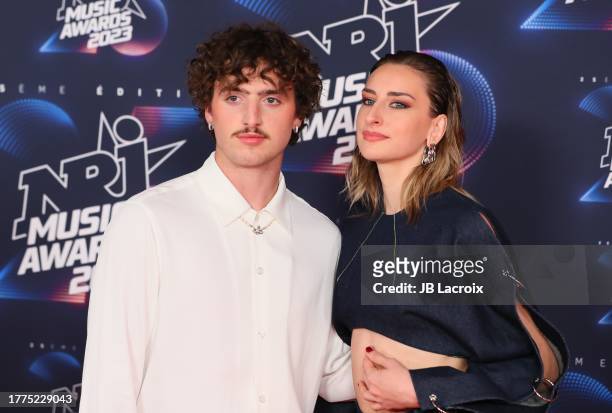 Benson Boone and Philipinne Lavrey attends the 25th NRJ Music Awards on November 10, 2023 in Cannes, France.