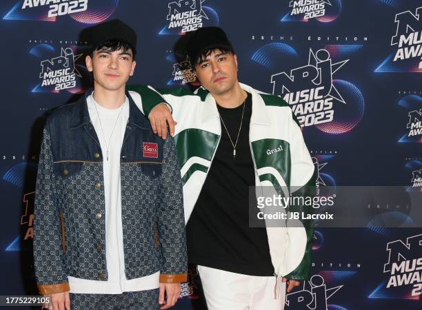 Josh Chergui and Loïs Serre of Trinix attends the 25th NRJ Music Awards on November 10, 2023 in Cannes, France.