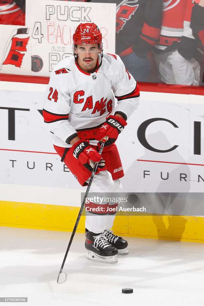 Seth Jarvis of the Carolina Hurricanes skates with the puck prior to