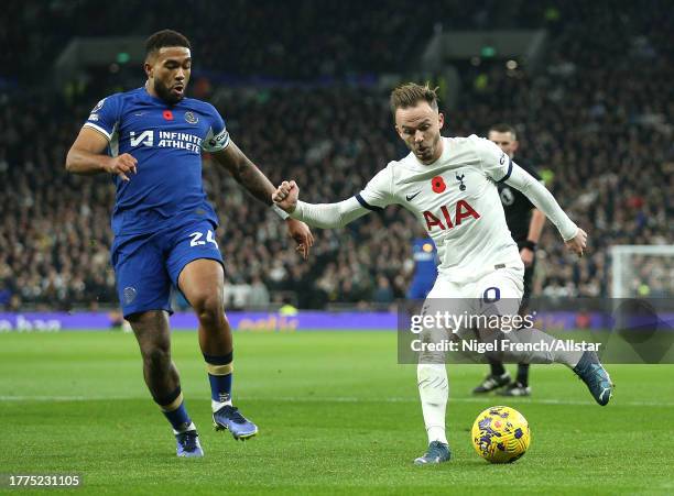 Reece James of Chelsea and James Maddison of Tottenham Hotspur challenge during the Premier League match between Tottenham Hotspur and Chelsea FC at...