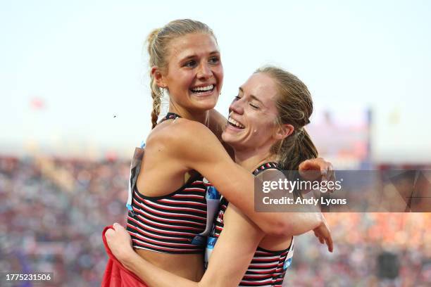 Alycia Butterworth of Team Canada celebrates with Kiana Gibson after competing in Women's 3000m Steeplechase at Estadio Nacional de Chile on Day 15...