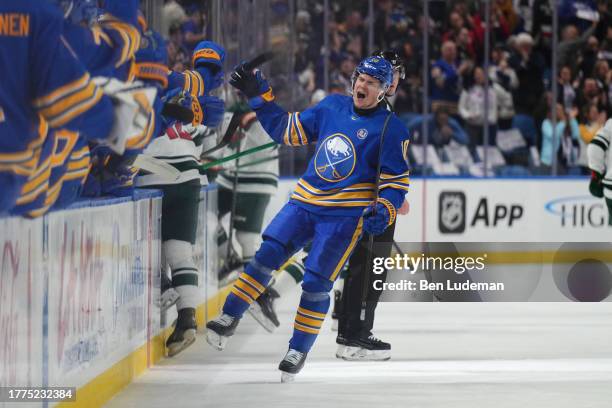 Henri Jokiharju of the Buffalo Sabres celebrates his first period goal with teammates on the bench during an NHL game against the Minnesota Wild on...