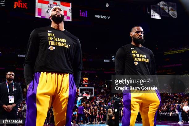 Anthony Davis and LeBron James of the Los Angeles Lakers look on during the game against the Phoenix Suns during the In-Season Tournament on November...